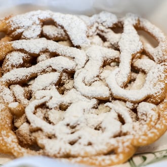 The Dayton Dragons displayed food offerings available to fans at Day-Air Ballpark this spring, including funnel cake. BRYANT BILLING / STAFF