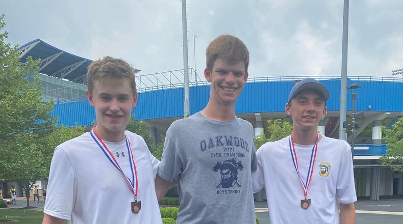 Noah Boyce (left) and Max McCloskey (right) pictured with Oakwood teammate Andrew Rich - Contributed