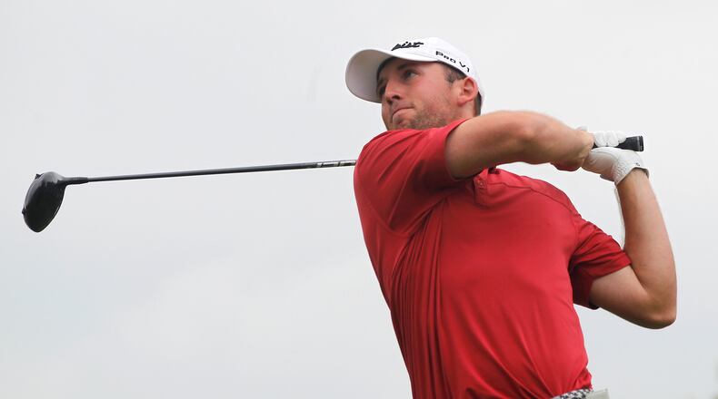 Austin Sipe, of Centerville, tees off after a rain delay Thursday during the third round of the Ohio Amateur at the Springfield Country Club. Bill Lackey/Staff