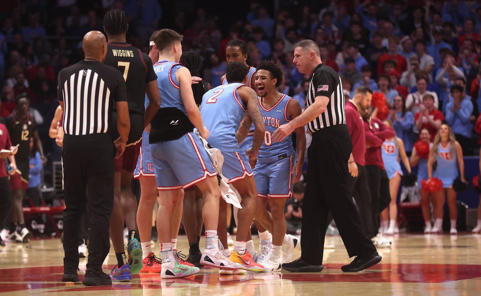 Dayton's Javon Bennett reacts after making a 3-pointer in the second half against Florida State on Tuesday, Dec. 16, 2025, at UD Arena. David Jablonski/Staff