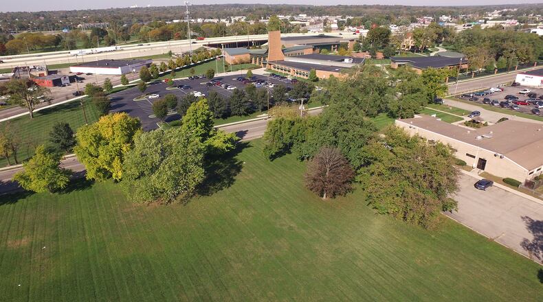 The Salvation Army Kroc Center has purchased this land across Webster Street to build a soccer field and amphitheater. TY GREENLEES / STAFF