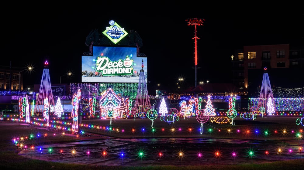 The first season of Deck the Diamond, a new Dayton holiday tradition at Day Air Ballpark, home of the Dayton Dragons, started on Nov. 14 and continues through Jan. 3, 2026. The family-friendly 45-night ticketed event features a winter wonderland of lights and decorations, tasty holiday treats and beverages, holiday shopping, the North Pole Express, a 44-foot-tall Christmas tree, photos with Santa and more. TOM GILLIAM/CONTRIBUTING PHOTOGRAPHER