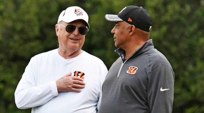 Head coach Marvin Lewis, right, and owner Mike Brown stand on the sideline during rookie camp for the Cincinnati Bengals Friday, May 6 at the practice fields next to Paul Brown Stadium in Cincinnati. NICK GRAHAM/STAFF