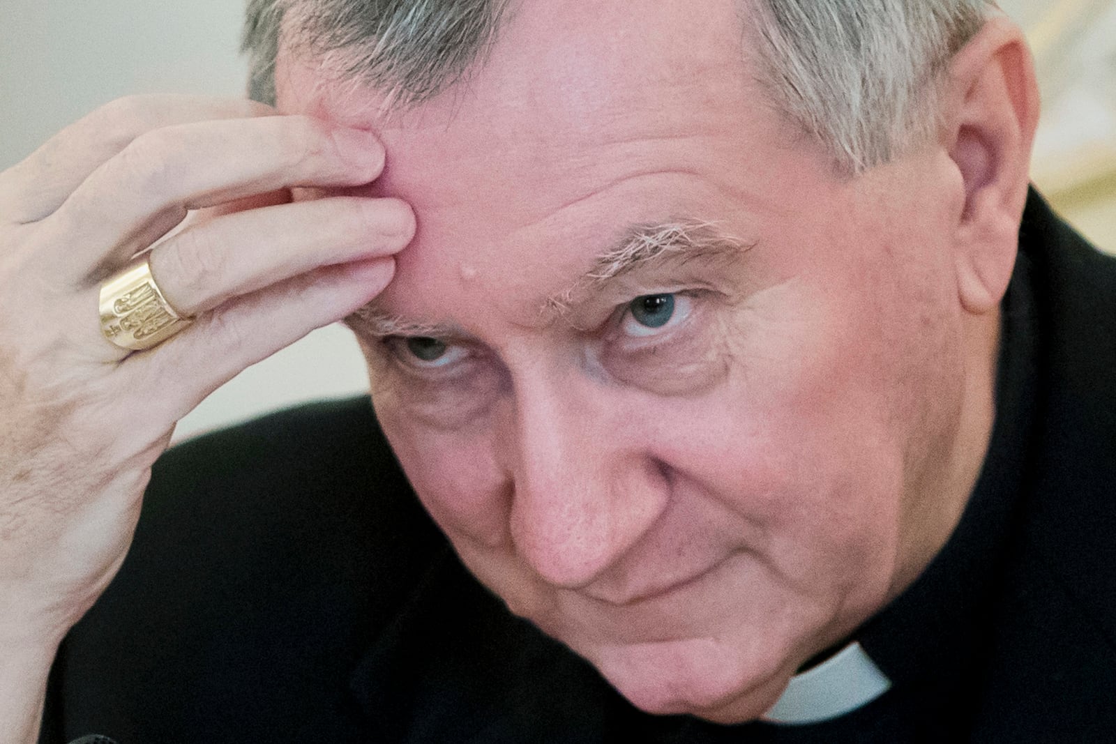 FILE - Vatican Secretary of State Cardinal Pietro Parolin attends a meeting with Russian Foreign Minister Sergey Lavrov in Moscow, Russia, Tuesday, Aug. 22, 2017. (AP Photo/Pavel Golovkin, file)