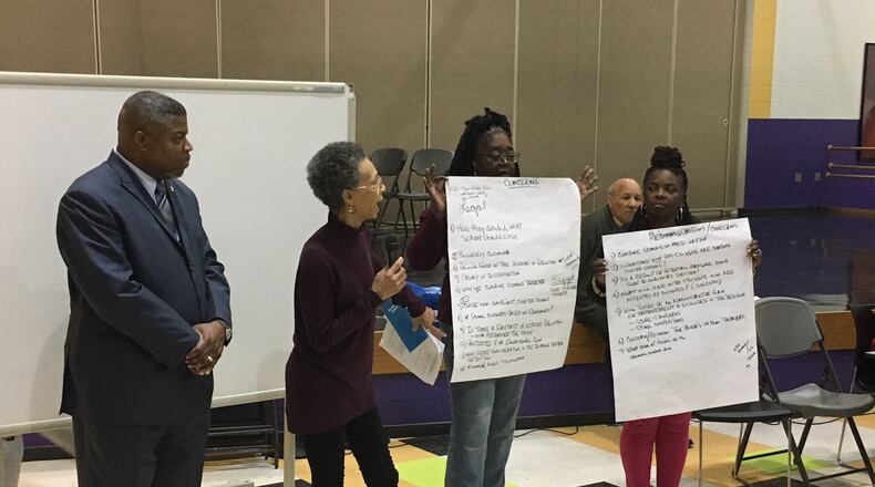 Each small group at the NAACP Town Hall meeting presented its concerns about Dayton Public Schools to the whole crowd on Monday, Jan. 22, 2018, at Dayton Boys Prep School. JEREMY P. KELLEY / STAFF