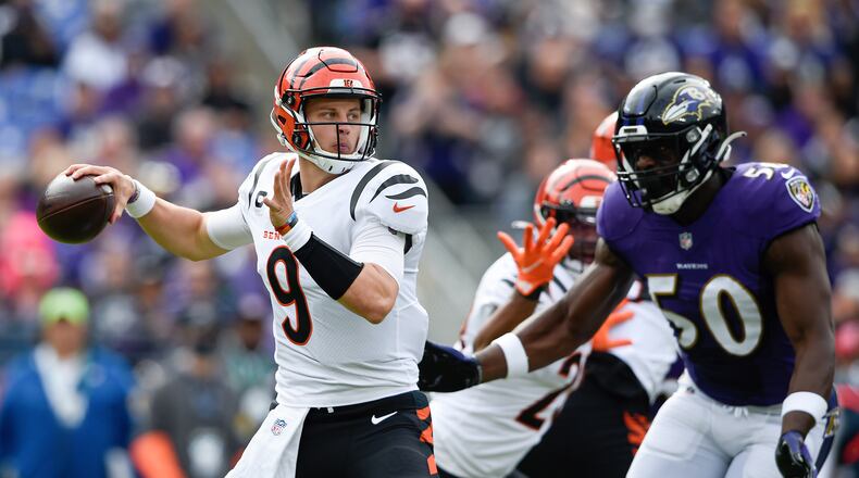 Cincinnati Bengals quarterback Joe Burrow throws a pass against the Baltimore Ravens during the first half of an NFL football game, Sunday, Oct. 24, 2021, in Baltimore. (AP Photo/Gail Burton)