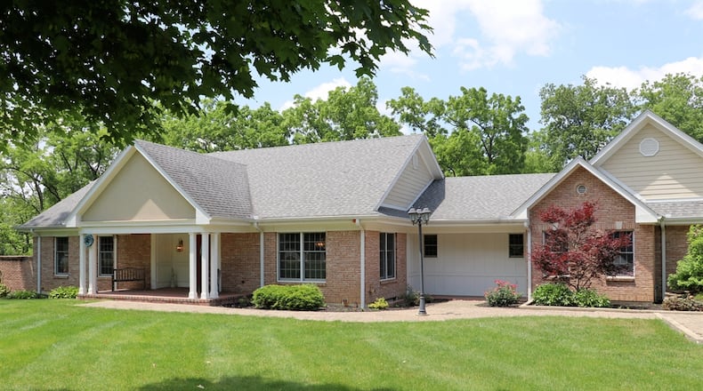 Listed for $899,900 by Coldwell Banker Heritage, the home at 4527 Swigart Road has about 4,573 square feet of living space including a walk-out lower level. CONTRIBUTED PHOTOS BY KATHY TYLER