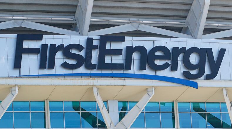 FILE - The signage for FirstEnergy Stadium is visible on the facade before an NFL preseason football game, Aug. 27, 2022, in Cleveland. The Ohio-based utility company says it's being investigated by a state office focused on organized crime in connection with payments the company made to the state's former House speaker and a top utility regulator, a news outlet reported Wednesday, Aug. 2, 2023. (AP Photo/Keith Srakocic, File)