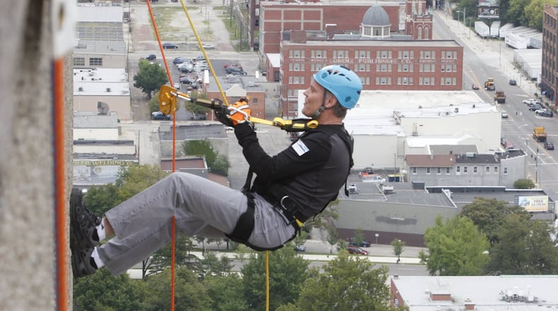 On August 14, 90 brave souls will rappel down the KeyBank Tower in downtown Dayton to benefit Big Brothers Big Sisters of the Greater Miami Valley at the fifth annual Over the Edge event. Non-rappellers can still revel and support on Courthouse Square with music, food trucks and more. Photo source: Facebook