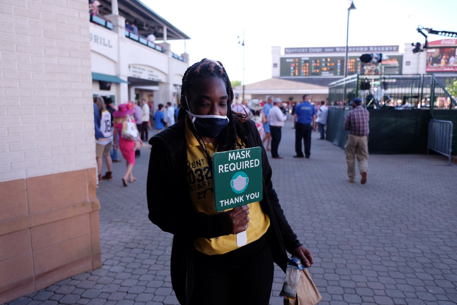 Face masks are required at Churchill Downs in Louisville, Ky., for the Kentucky Oaks race on Friday, April 30, 2021. (Christian Hansen/The New York Times)