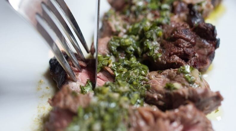 Churrasco, a Brazilian dish of grilled beef with chimichurri. (Austin Steele/St. Louis Post-Dispatch/TNS)