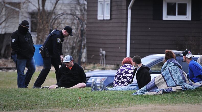 Multiple people have been detained after police executed a drug-related search warrant at a house on Pittsfield Street in Kettering Monday morning. Photo by Marshall Gorby