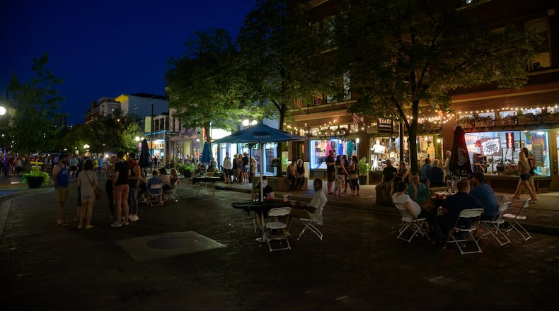 Did we spot you at The Oregon District's new Out on 5th weekend event on Saturday, September 5, 2020? Labor Day weekend was the debut of The Oregon District's new Designated Outdoor Refreshment Area (DORA). 5th Street will be closed to vehicle traffic on the weekends until the end of October to allow for expanded outdoor seating, sidewalk sales and musical entertainment. The goal of Out on 5th is to help Oregon District businesses increase seating capacity outdoors due to limited indoor seating for social distancing requirements during the coronavirus pandemic. TOM GILLIAM/CONTRIBUTING PHOTOGRAPHER