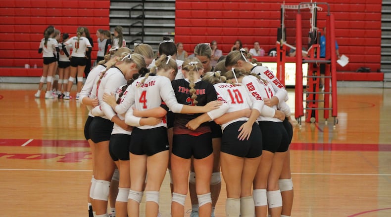 The Tippecanoe girls volleyball team huddles together during a recent match. COURTNEY POST / CONTRIBUTED PHOTO