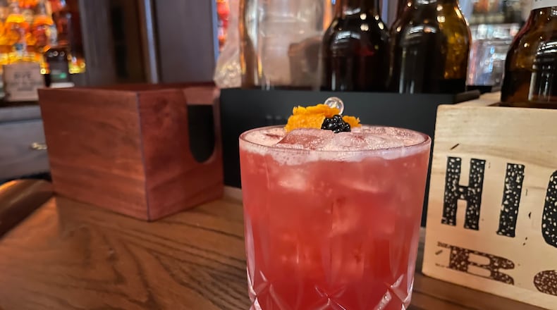 Crafted & Cured has added a bar to its second floor featuring bourbon and craft cocktails at 8 S. Market St. in Troy. NATALIE JONES/STAFF