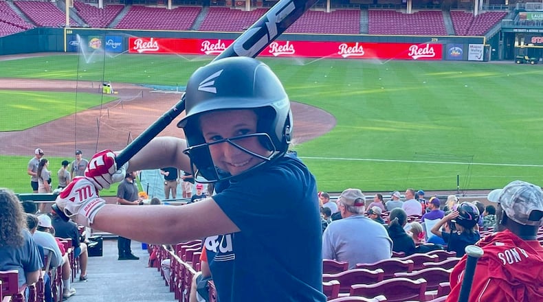 Piper Wade, 8, of Beavercreek participates in a Major League Baseball Pitch, Hit & Run competition at Great American Ball Park in Cincinnati in 2022. Contributed photo