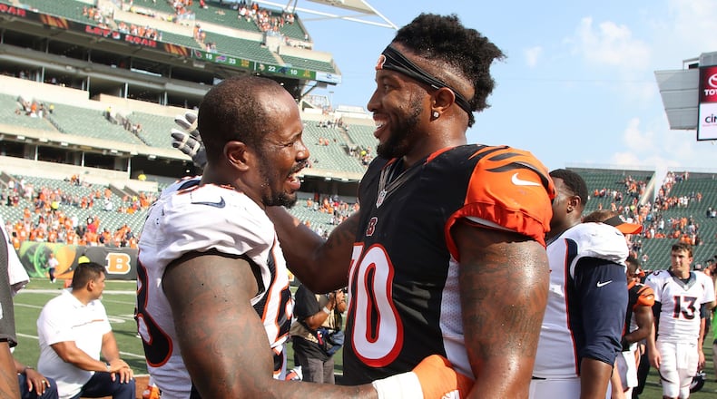 CINCINNATI, OH - SEPTEMBER 25: Von Miller #58 of the Denver Broncos and Cedric Ogbuehi #70 of the Cincinnati Bengals congratulate each other after the game at Paul Brown Stadium on September 25, 2016 in Cincinnati, Ohio. Denver defeated Cincinnati 29-17. (Photo by John Grieshop/Getty Images)