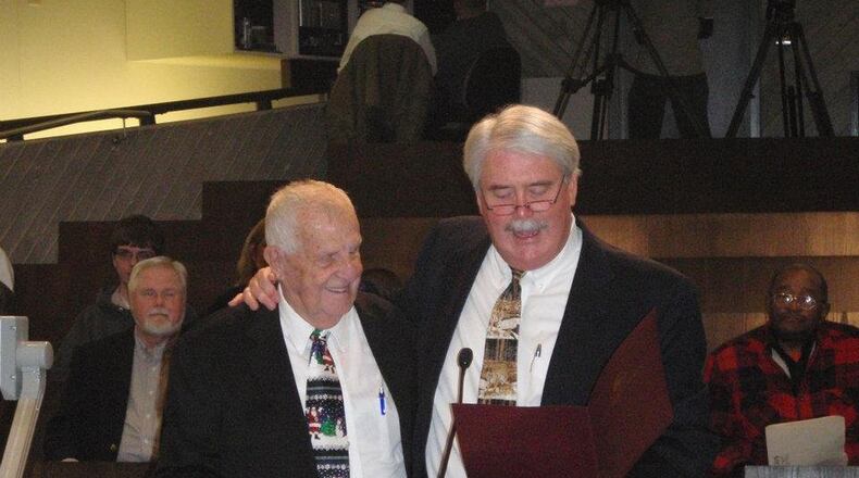 Former Kettering assistant police chief and city councilman Keith Thompson, who served the city for 55 years, has died. In this photo from 2011, Thompson, left, is shown being honored by Mayor Don Patterson. CONTRIBUTED