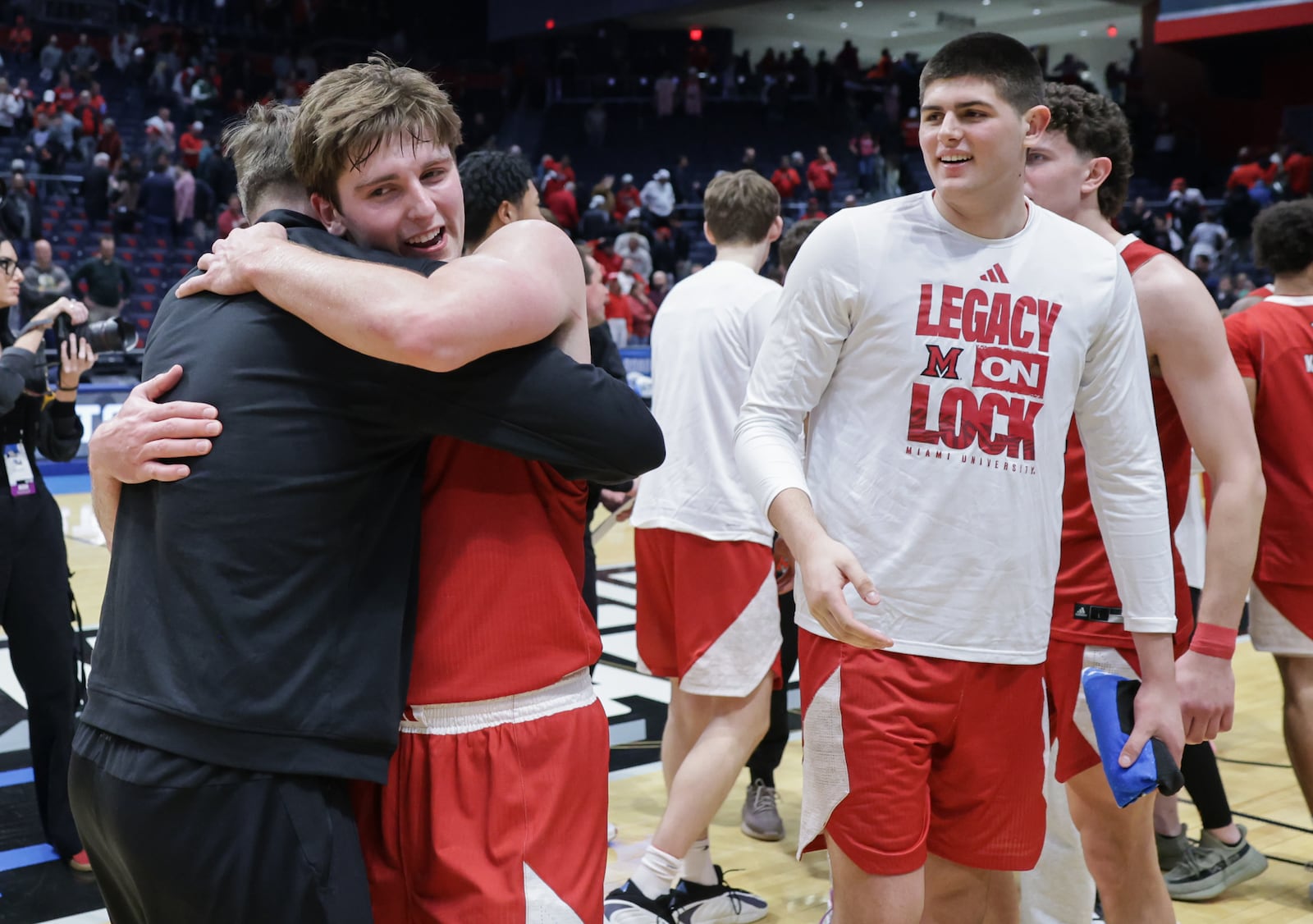 Miami University senior guard Peter Suder (left) following an 89-79 win over Southern Methodist in an NCAA First Four game on Wednesday, March 18 at University of Dayton Arena. BRYANT BILLING / STAFF