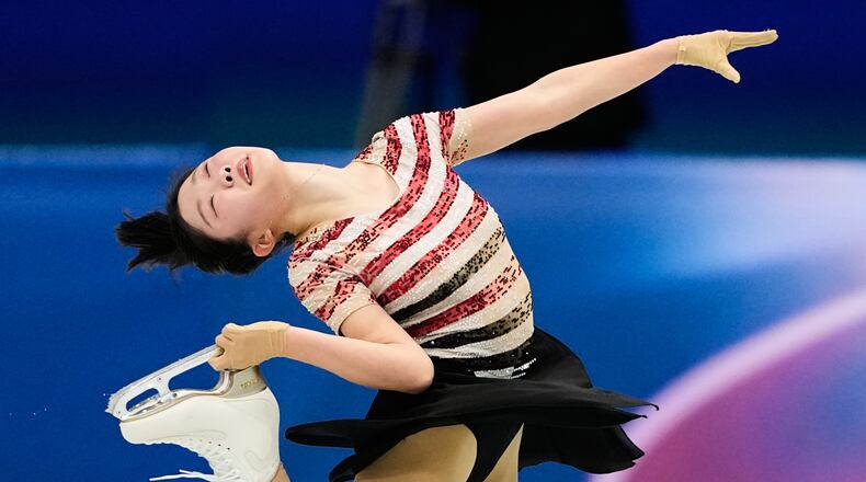Ami Nakai of Japan competes during the women's short program figure skating at the 2026 Winter Olympics, in Milan, Italy, Tuesday, Feb. 17, 2026. (AP Photo/Natacha Pisarenko)