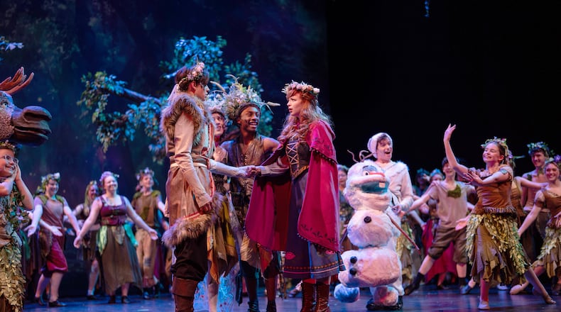 Center left to right: Eli Ramos (Kristoff), Via Mongelli (Bulda), Josiah Watson (Pabbie), Tabitha Powell (Anna), Landon Urlage (Olaf) and cast sing "Fixer Upper" in Muse Machine's production of Disney's "Frozen." Photo by Matt Silver