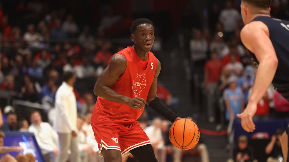 Dayton's Adam Njie Jr. dribbles against Penn State in an exhibition game on Sunday, Oct. 19, 2025, at UD Arena. David Jablonski/Staff