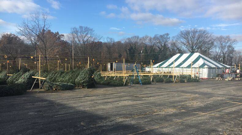 As construction continues in the area of his new location, due to the big Schantz Avenue bridge rebuild at South Patterson Boulevard, Joe Pine’s owner Bob Stone hopes that patrons will be able to navigate the detour signs to buy their Christmas trees. STAFF
