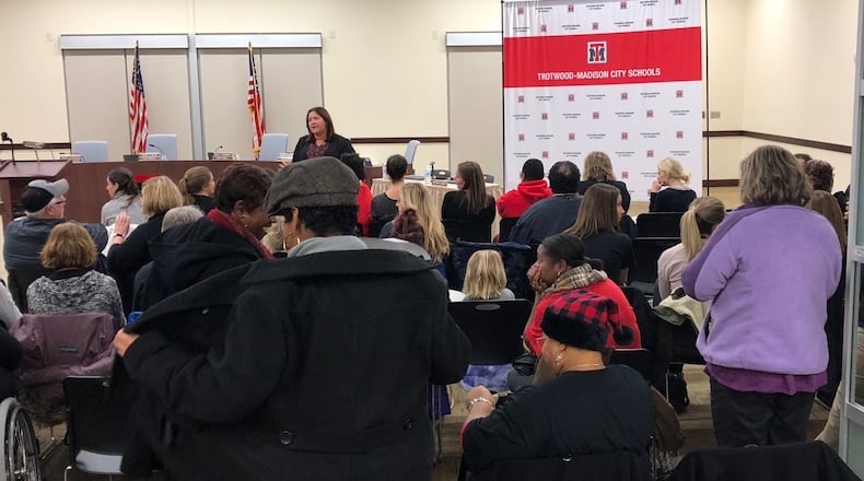 Dozens of teachers wait for a Trotwood school board meeting to begin on Dec. 6, 2018. The teachers union expressed “deep concern” about a multiyear contract for superintendent Tyrone Olverson, but the school board approved the deal.