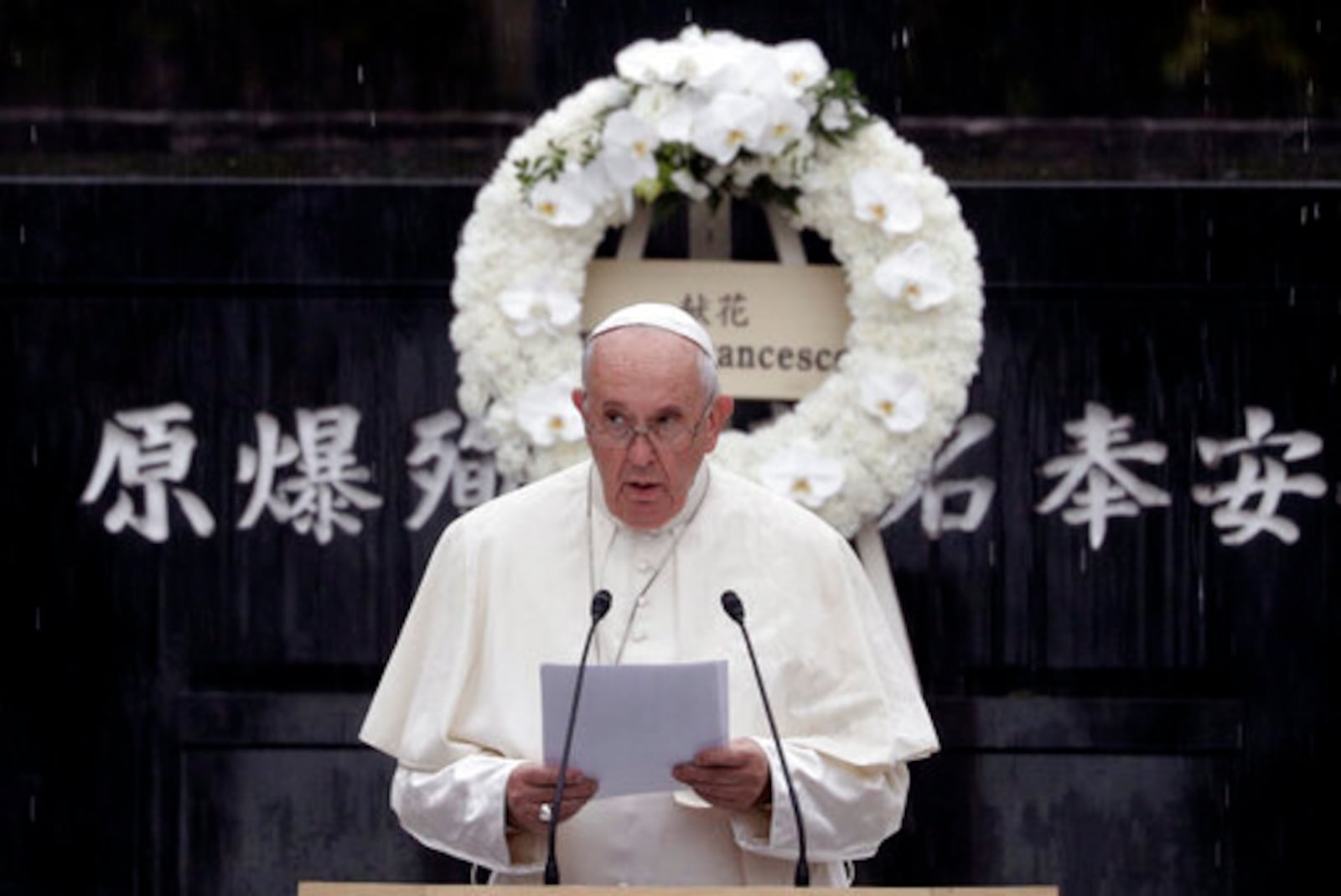FILE - Pope Francis delivers his speech at the Atomic Bomb Hypocenter Park, in Nagasaki, Japan, Sunday, Nov. 24, 2019. (AP Photo/Gregorio Borgia, file)