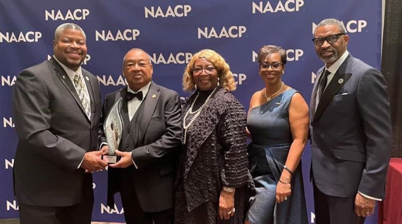 The Dayton Unit NAACP won two national awards at the National Convention of the NAACP in July. Pictured above, fromleft, is Derrick Foward, president of the Dayton Unit, with Leon W. Russell, chair of the National Board of Directors; Gloria Sweetlove, national membership and units chair; Karen Boykin-Townes, vice chair of the National Board of Directors; and Derrick Johnson, NAACP's national president and CEO. CONTRIBUTED