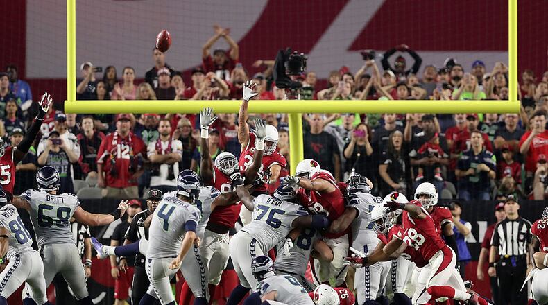 GLENDALE, AZ - OCTOBER 23: Kicker Stephen Hauschka #4 of the Seattle Seahawks misses a field goal in overtime as the Arizona Cardinals attempt to block during the NFL game at the University of Phoenix Stadium on October 23, 2016 in Glendale, Arizona. The Cardinals and Seahawks tied 6-6. (Photo by Christian Petersen/Getty Images)