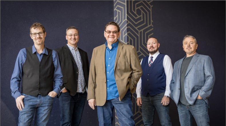 Joe Mullins & the Radio Ramblers, (left to right) Chris Davis, Jason Barie, Mullins, Adam McIntosh and Randy Barnes, International Bluegrass Music Association’s Entertainer of the Year of 2019, performs at Clifton Opera House in Clifton on Friday, April 21.