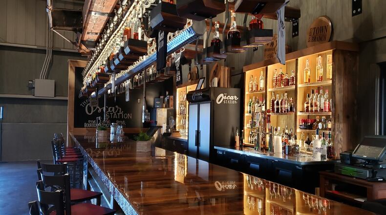 ORIGINAL CUTLINE: The Oscar Station, a new venue at Jungle Jim’s International Market in Fairfield, features a bourbon bar with more than 100 different bourbons, 45 of them highlighted via an overhead conveyor belt. It’s connected to the Oscar Event Center via a monorail that operates during select Junglefests and private events, weather permitting. ERIC SCHWARTZBERG/STAFF