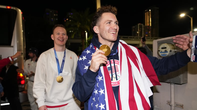 United States hockey player Matthew Tkachuk arrives at E11EVEN after the team won the gold medal at the Milan Cortina Olympics, Monday, Feb. 23, 2026, in Miami. (AP Photo/Lynne Sladky)