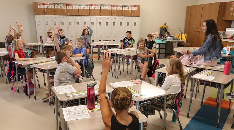 Students and teachers get to know each other on  the first day of school at Shawnee Elementary last year. BILL LACKEY/STAFF