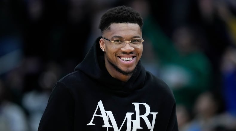 Milwaukee Bucks' Giannis Antetokounmpo smiles during the first half of an NBA basketball game against the Indiana Pacers, Friday, Feb. 6, 2026, in Milwaukee. (AP Photo/Aaron Gash)