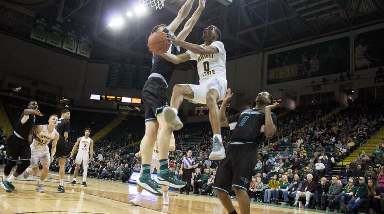 Wright State freshman Jaylon Hall puts up a shot against Wisconsin-Green Bay last season at the Nutter Center. ALLISON RODRIGUEZ/CONTRIBUTED PHOTO