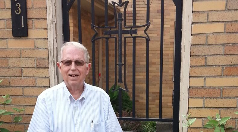 Brother Joe Fisher, standing outside the Missionaries of the Precious Blood offices on East Second Street in Dayton, celebrated his 40th anniversary of religious service. CONTRIBUTED