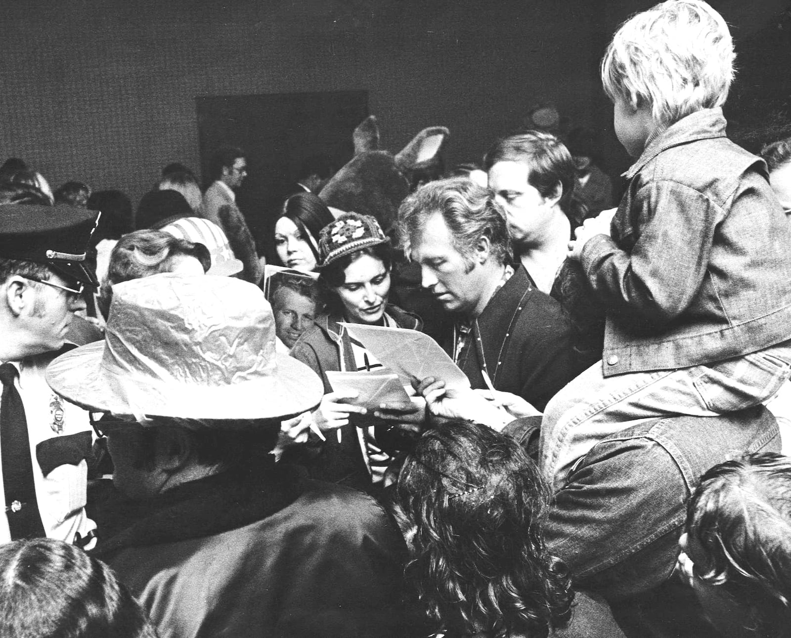 Evel Knievel signing autographs. Oct.17, 1975. DAYTON DAILY NEWS ARCHIVES