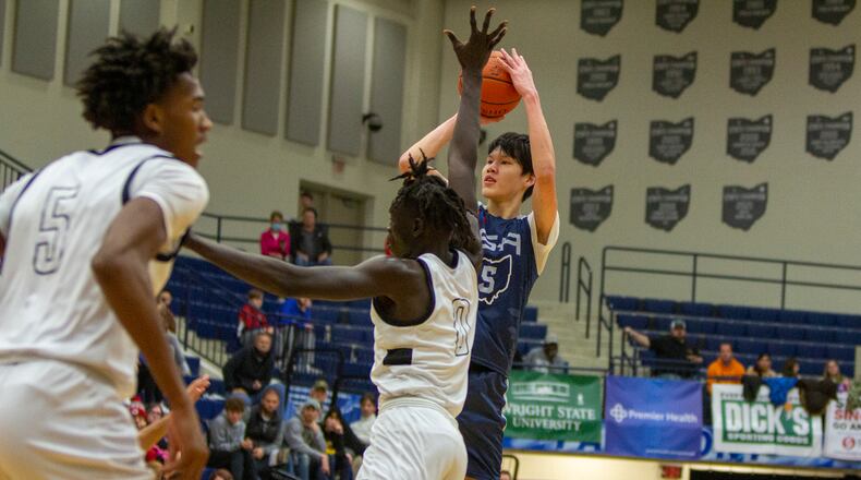 Dayton men’s basketball commit Mike Sharavjamts scored 16 points Friday night for ISA Andrews Osborne at the Premier Health Flyin’ To The Hoop showcase at Trent Arena in Kettering. Jeff Gilbert/CONTRIBUTED