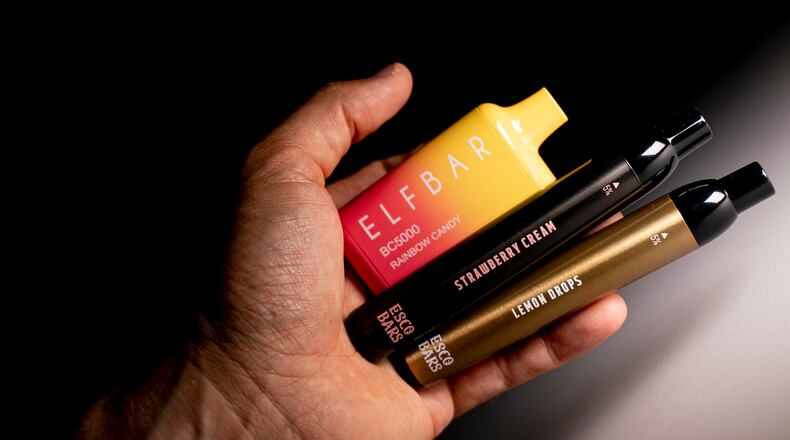 Elf Bar and Esco Bar disposable vaping devices are displayed, Monday, June 26, 2023, in Washington. The number of electronic cigarette devices sold in the U.S. has nearly tripled since 2020, driven almost entirely by a wave of unauthorized disposable vapes from China, according to sales data obtained by The Associated Press. Recently U.S. health regulators have begun trying to block imports of several of the biggest brands, including Elf Bar and Esco Bar. (AP Photo/Andrew Harnik)