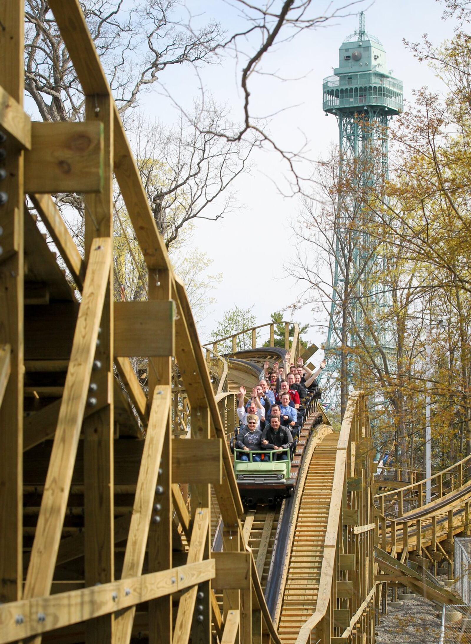 Ride enthusists enjoy a ride on the new wooden roller coaster, Mystic Timbers, at Kings Island. COX MEDIA GROUP OHIO
