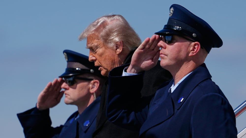 President Donald Trump arrives on Air Force One, Wednesday, March 18, 2026, at Dover Air Force Base, Del., to attend the casualty return for the six crew members of an Air Force refueling aircraft who died when their plane crashed in western Iraq while supporting operations against Iran. (AP Photo/Julia Demaree Nikhinson)