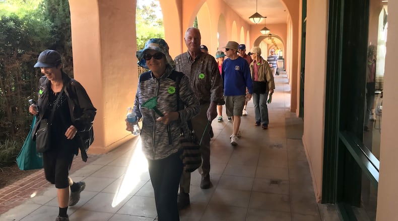 A volunteer with the local nonprofit Walkabout leads a walk through Liberty Station in Point Loma as part of an event to celebrate the organization’s 40th anniversary. (Morgan Cook/San Diego Union-Tribune/TNS)