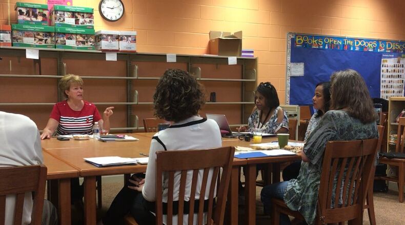 Superintendent Elizabeth Lolli explains a busing proposal for DPS high school students at the Dayton school board retreat, Saturday morning, June 29, 2019, at World of Wonder school. JEREMY P. KELLEY / STAFF