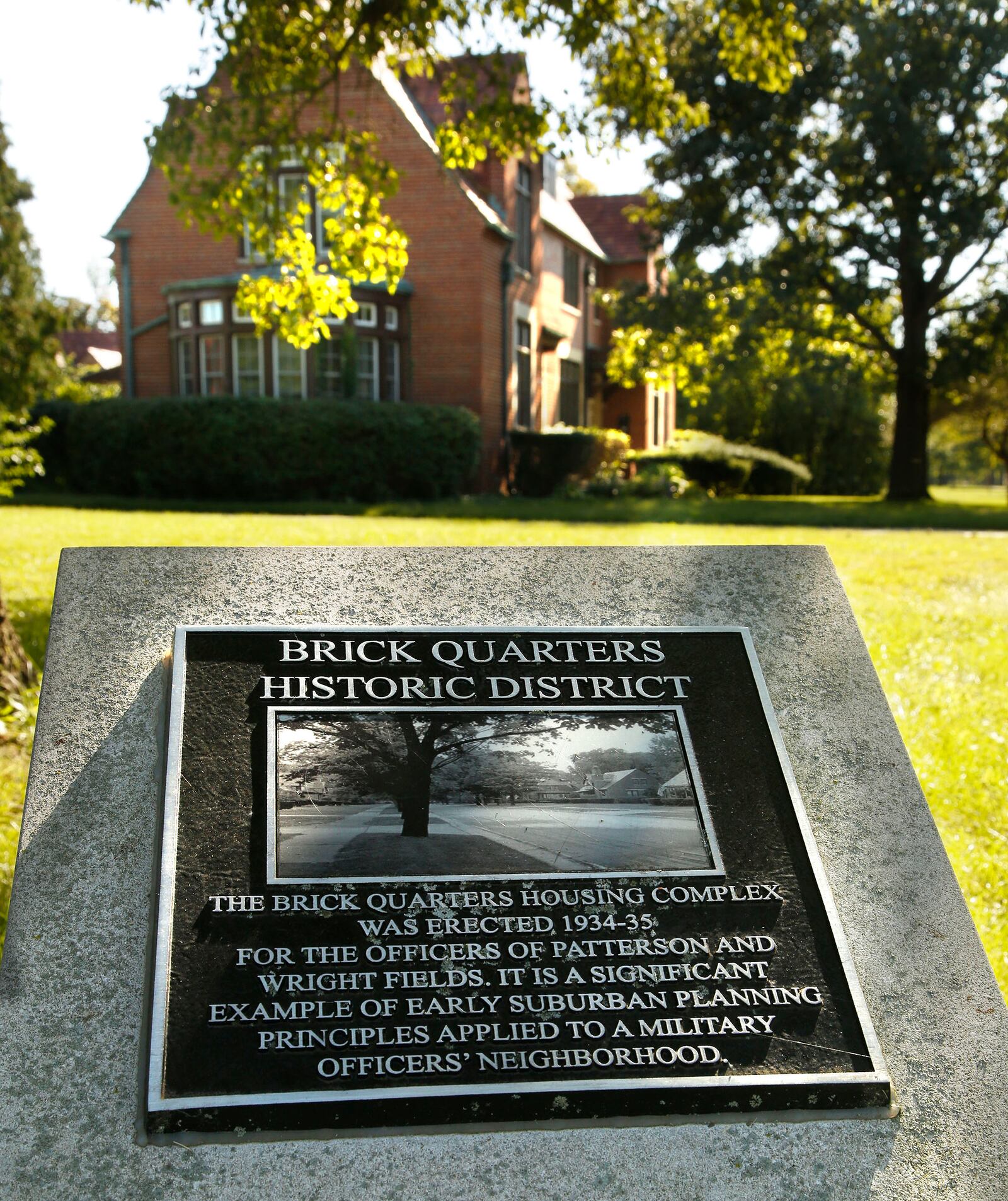 The Air Force is exploring a "full gamut"of options to tear down or fund  a costly renovation of historic brick homes at Wright-Patterson, which has nearly all of the dozens of remaining government-owned homes in the military branch. This home was constructed with 88 others between 1934-37 that are listed on the National Register of Historic Places in the Brick Quarters Housing District.  TY GREENLEES / STAFF