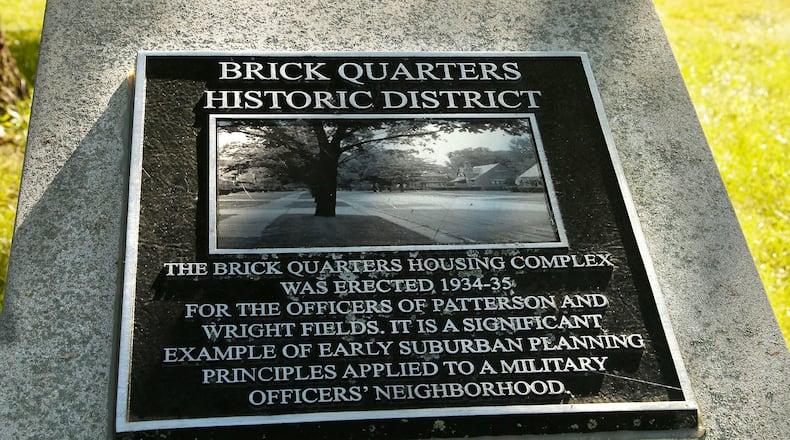 The Air Force is exploring a "full gamut"of options to tear down or fund  a costly renovation of historic brick homes at Wright-Patterson, which has nearly all of the dozens of remaining government-owned homes in the military branch. This home was constructed with 88 others between 1934-37 that are listed on the National Register of Historic Places in the Brick Quarters Housing District.  TY GREENLEES / STAFF