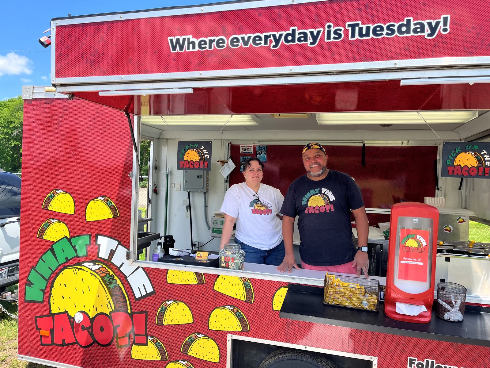 Pictured is Cory Thompson, president of the Dayton Food Truck Association and owner of What The Taco?!, with employee Mackenzie Nangle. NATALIE JONES/STAFF