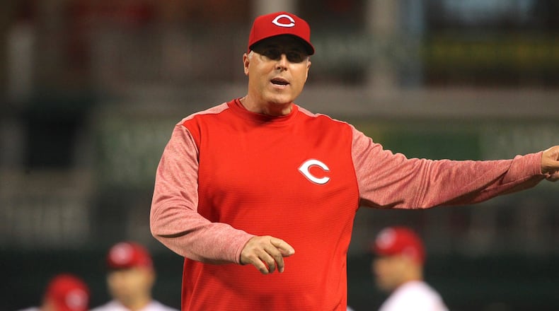 Reds manager Bryan Price argues a call during a game against the Cardinals on April 20, 2017, at Great American Ball Park in Cincinnati. David Jablonski/Staff