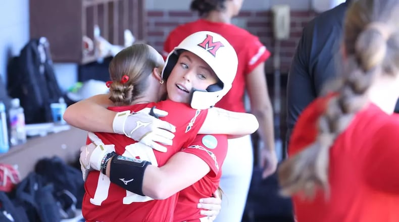 Miami senior Jenna Golembiewski hugs teammate Madilyn Reeves during their Knoxville Regional NCAA Tournament game against Ohio State on Saturday. MIAMI ATHLETICS / CONTRIBUTED